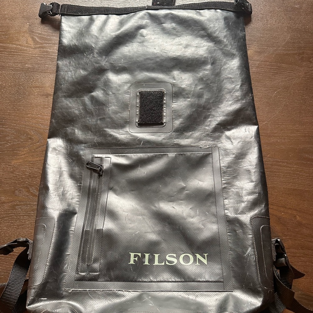 Filson Black Roll-Top Waterproof Backpack with Front Zip Pocket